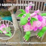 Green and pink 3-in-1 flower dragon crochet blanket displayed on a wooden garden bench, with an inset showing how it folds into a compact plush toy. The dragon features leafy ears, flower-covered wings, floral blanket details, and long legs. Original design by Ariana of CraftingHappiness.